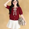 Áo Len Nữ Cộc Tay Thắt Nơ Cổ Tròn Dệt Kim Họa Tiết Quả Trám EVALOVER